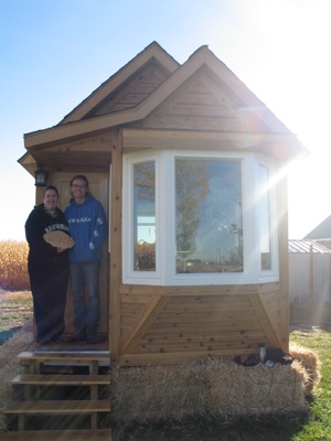 Jewels Hall-Payne (L) and Molly Hall-Payne (R) stand next to their tiny home in Eaton. Photo: Susan Glairon.
