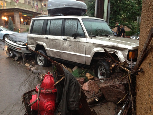 Vehicles crashed into the spa building's parking garage at Canon and Park avenues. Cliff House in background.