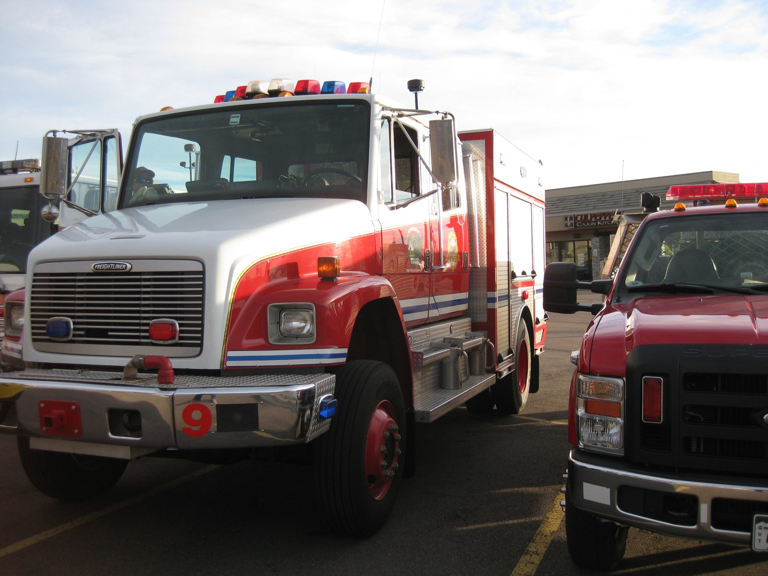 Trucks wait in preparation for the evacuation drill.