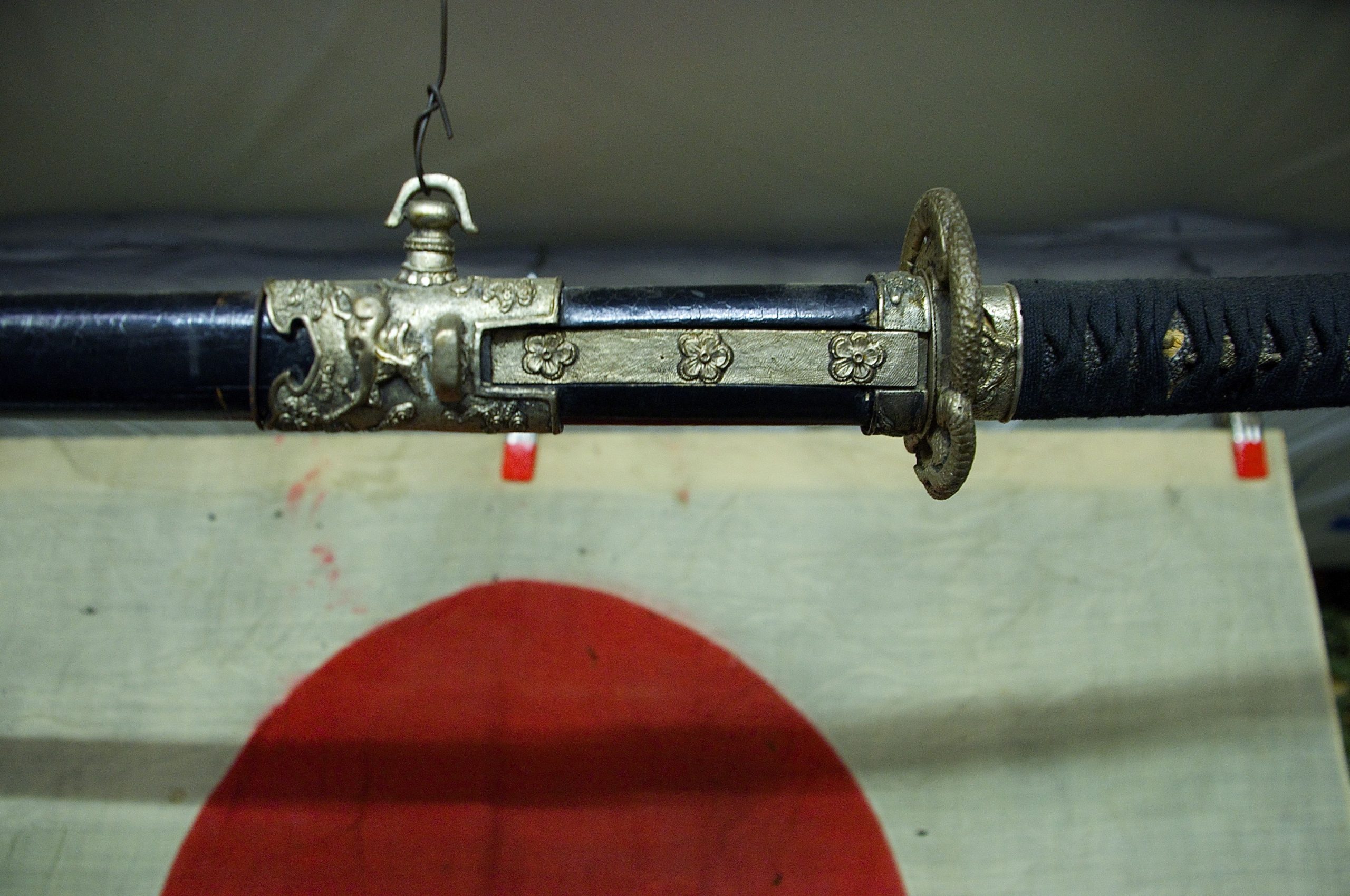 Samurai sword and WWII-era Japanese flag