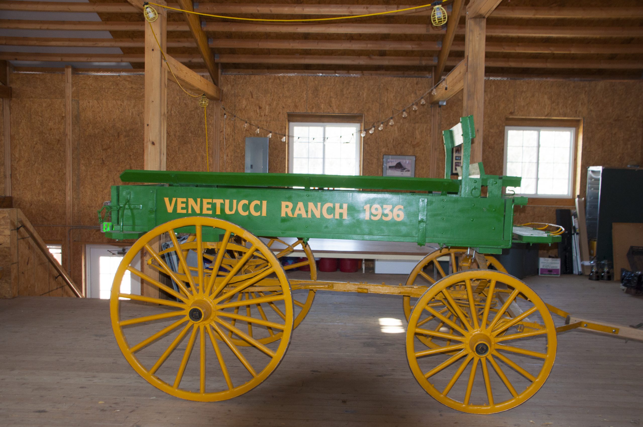 Historic farm cart with yellow wheels