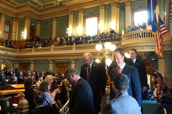 Colorado Gov. Jared Polis leaves the podium after delivering his first State of the State address to lawmakers Thursday morning.