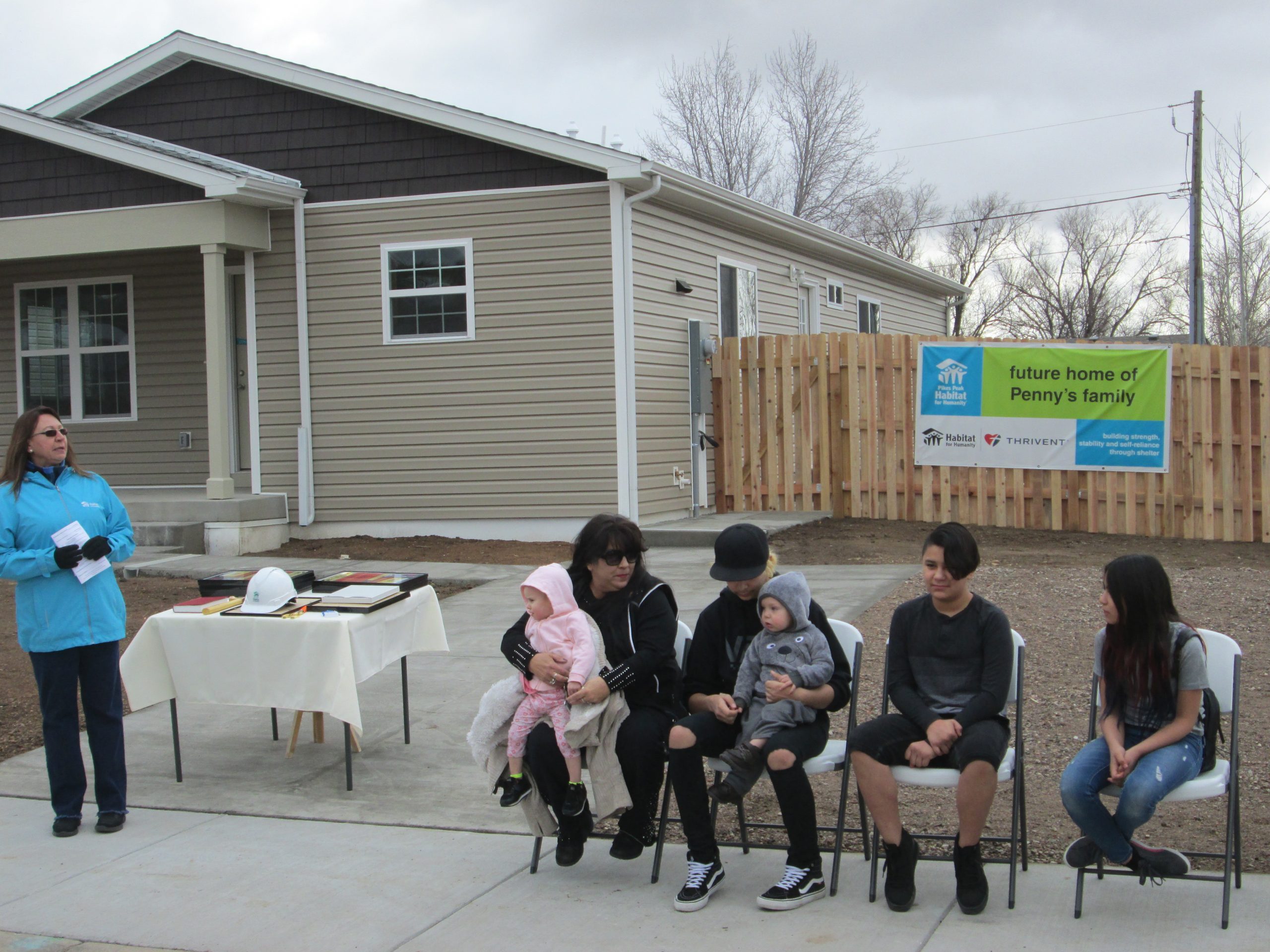 Penny and her family at the home dedication ceremony on January 12, 2019.