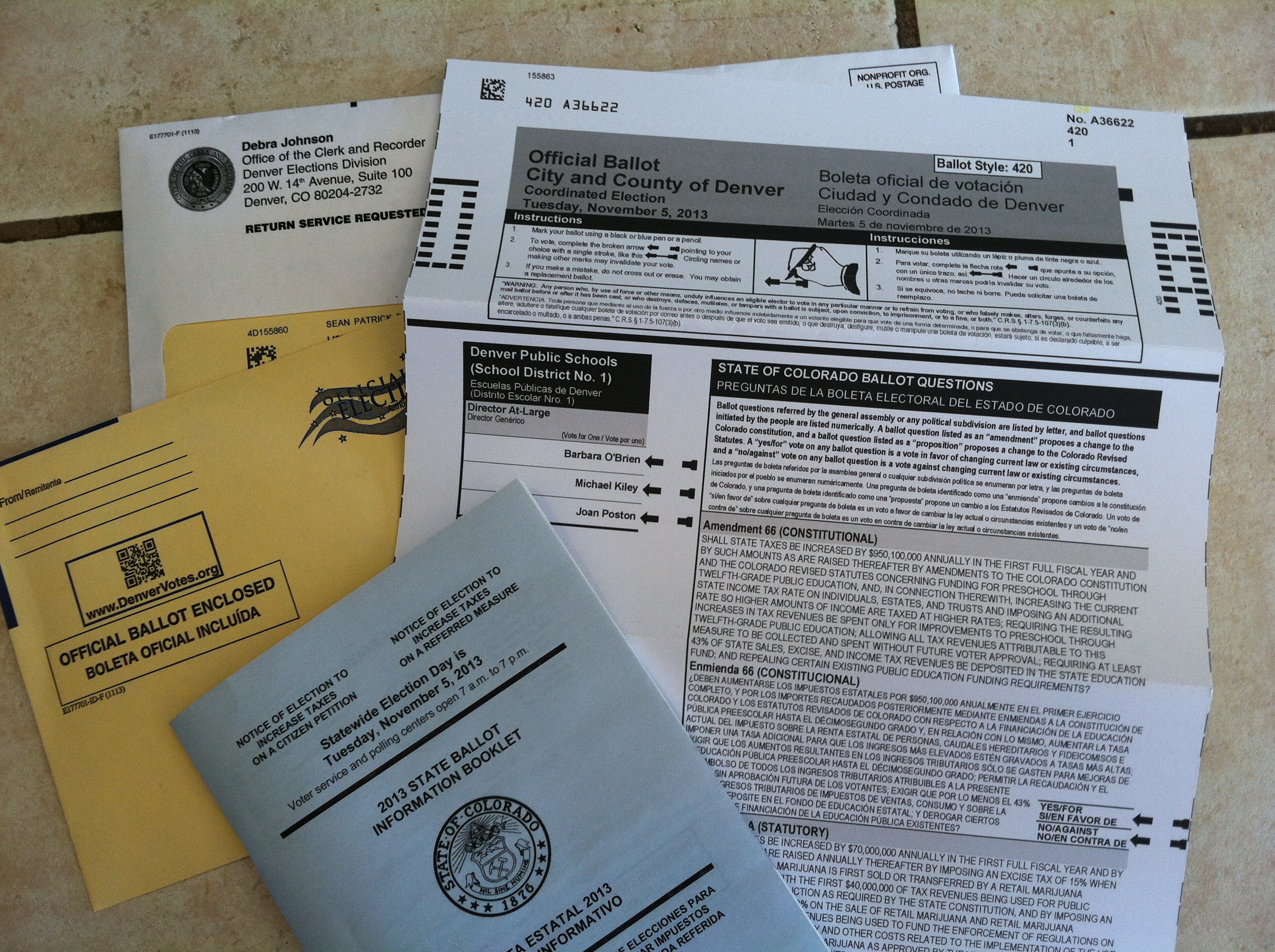 A 2013 ballot and voter blue book.