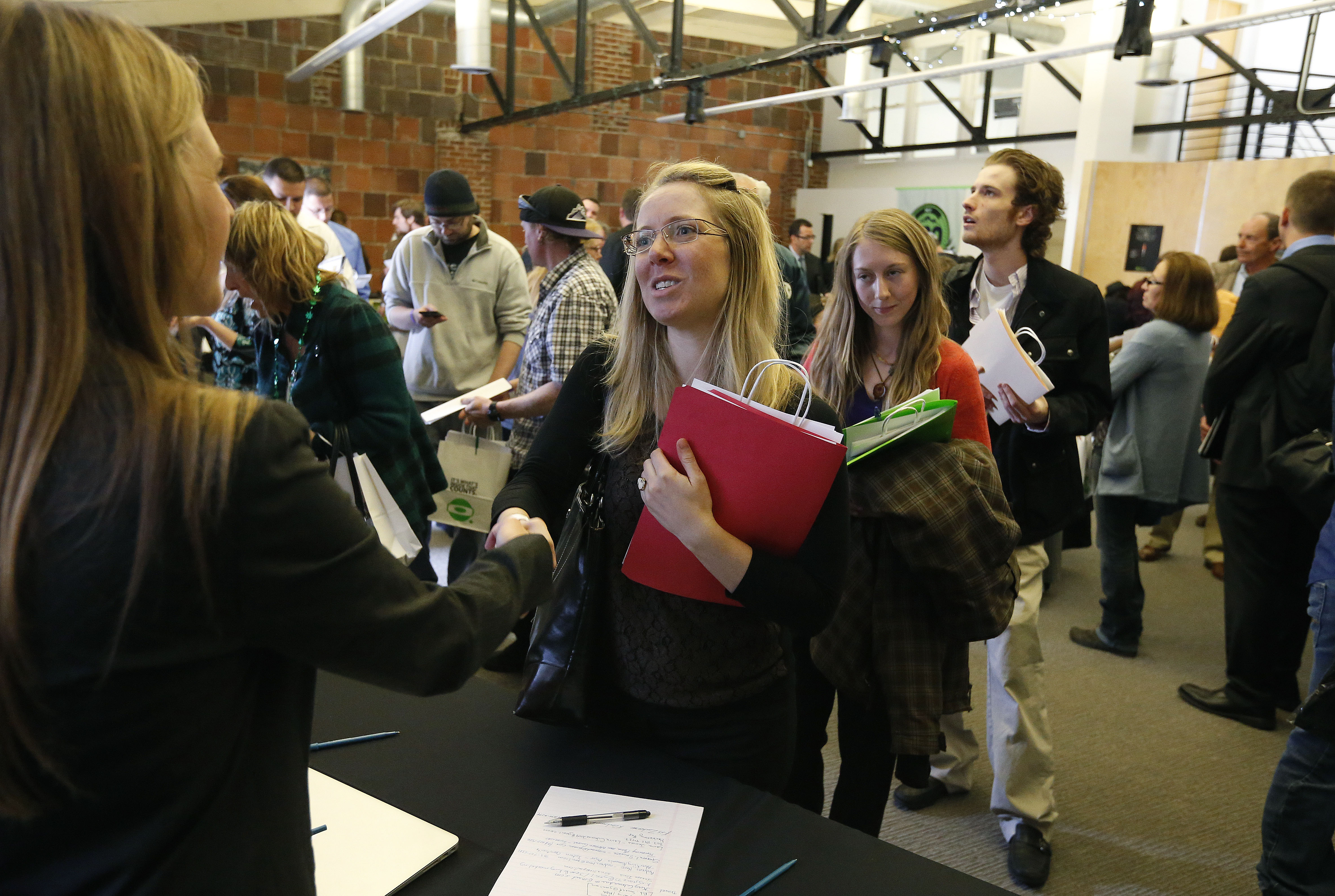 Photo: Denver job fair (AP Photo)