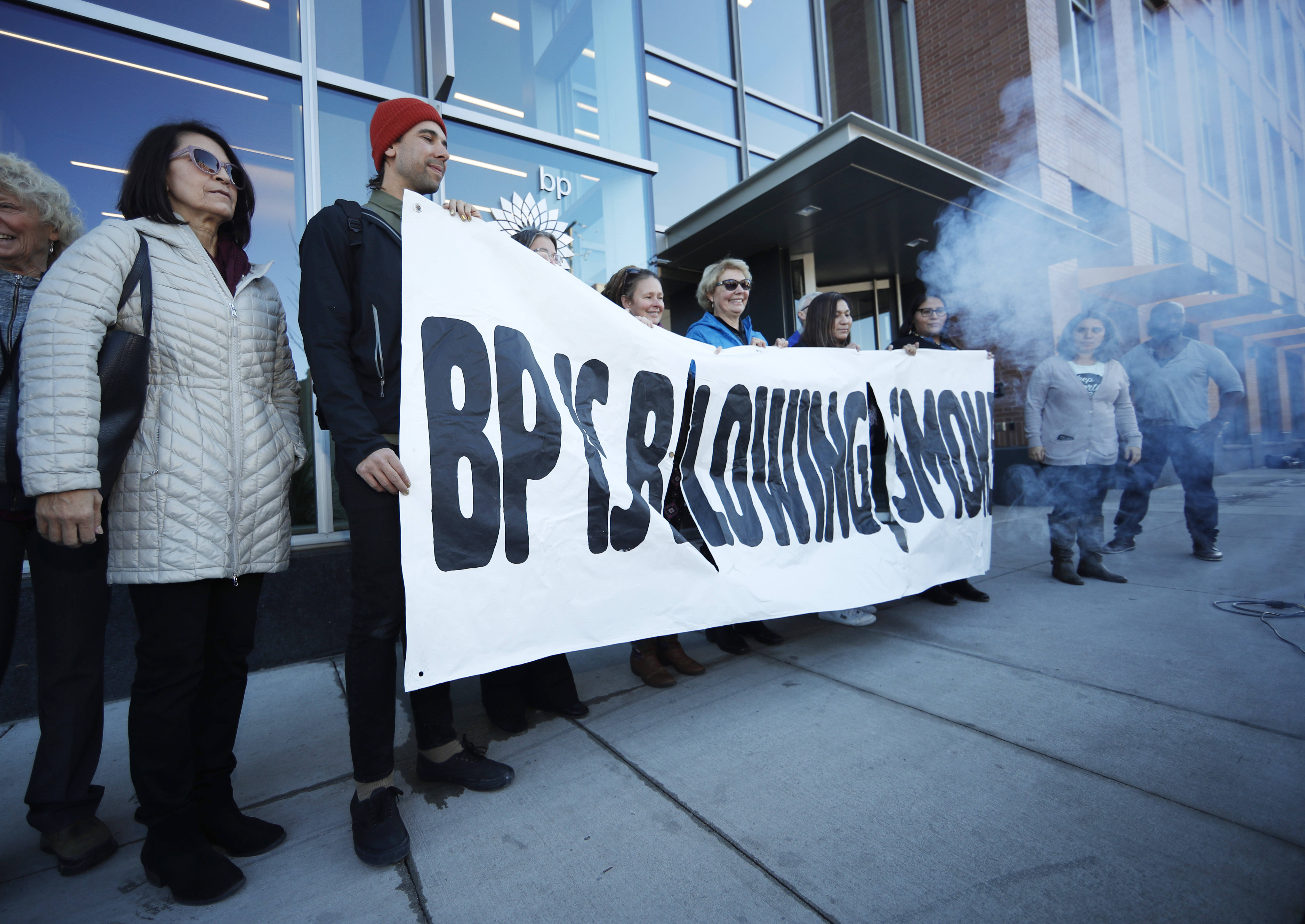 <p>Activists from ProgressNow Colorado, grassroots organizations and stakeholders join forces to demonstrate outside the United States headquarters of BP, Wednesday, Nov. 14, 2018, in Denver. Meanwhile, only blocks to the east, the U.S. Environmental Protection Agency holds its only public hearing on the Trump administration's plans to roll back Obama-era rules for methane pollution from the oil and gas industry.</p>