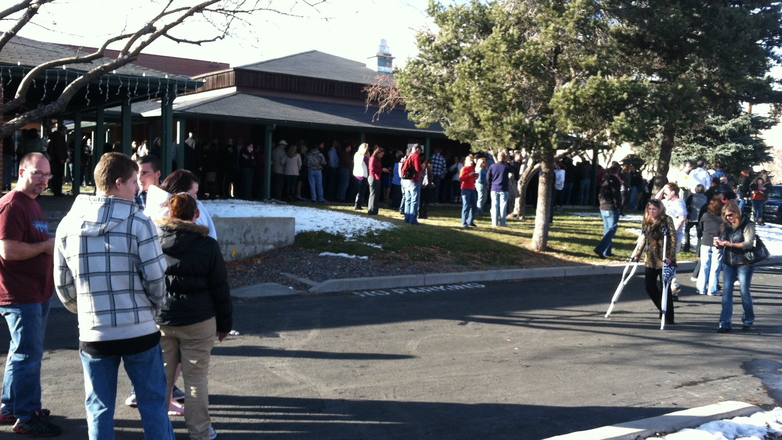 Photo: Parents outside church after Arapahoe High School shooting.