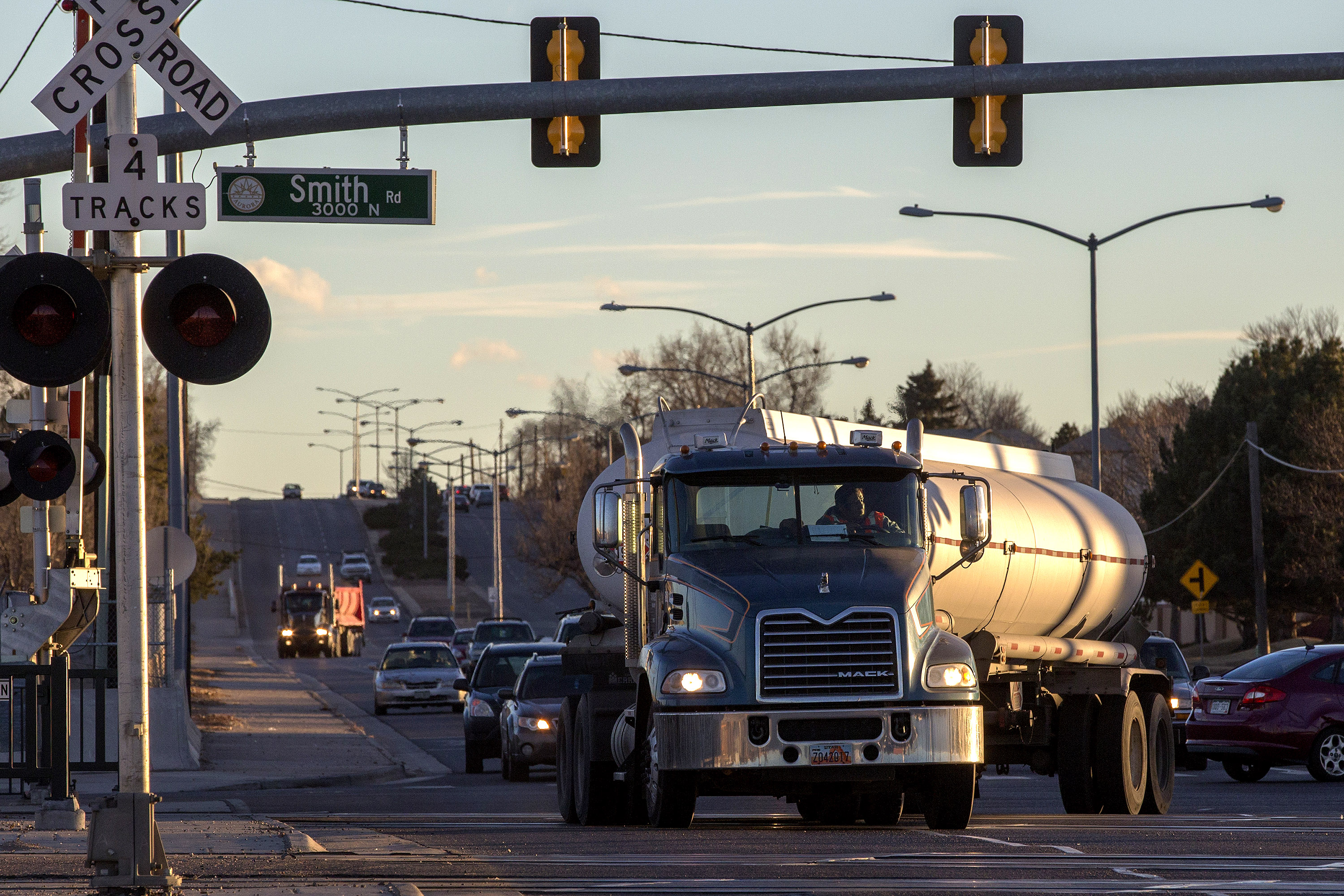 <p>A tanker truck cross the railroad tracks at Smith Road and Chambers Road in Aurora On Monday, Jan. 7, 2018.</p>