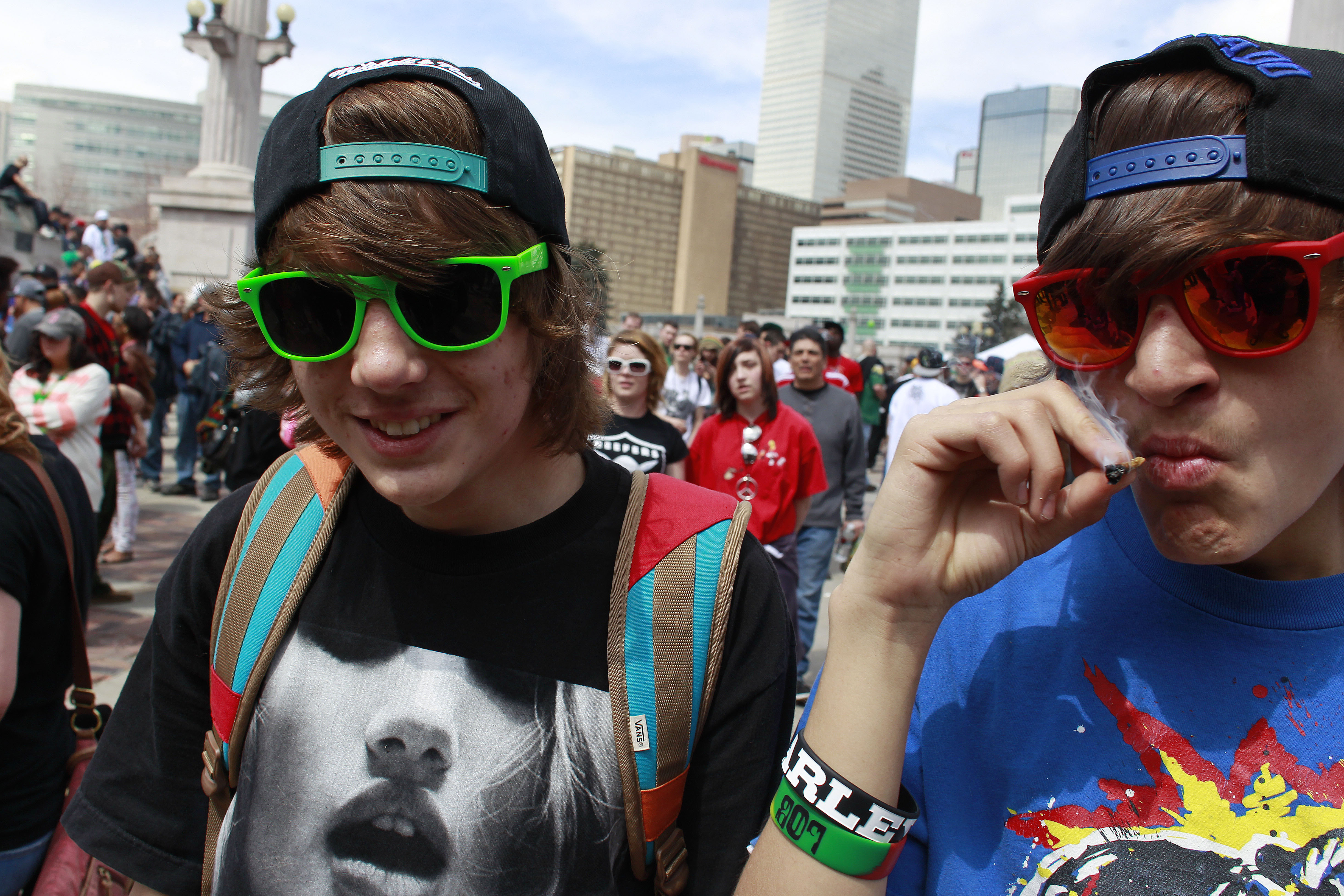 Photo: Youths smoke marijuana, Denver 4/20 rally, Civic Center Park, 2013(AP Photo)