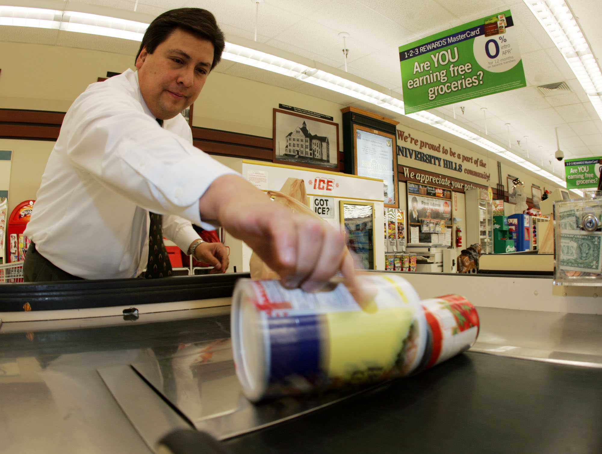 Photo: Bagging groceries at King Soopers (AP Photo)