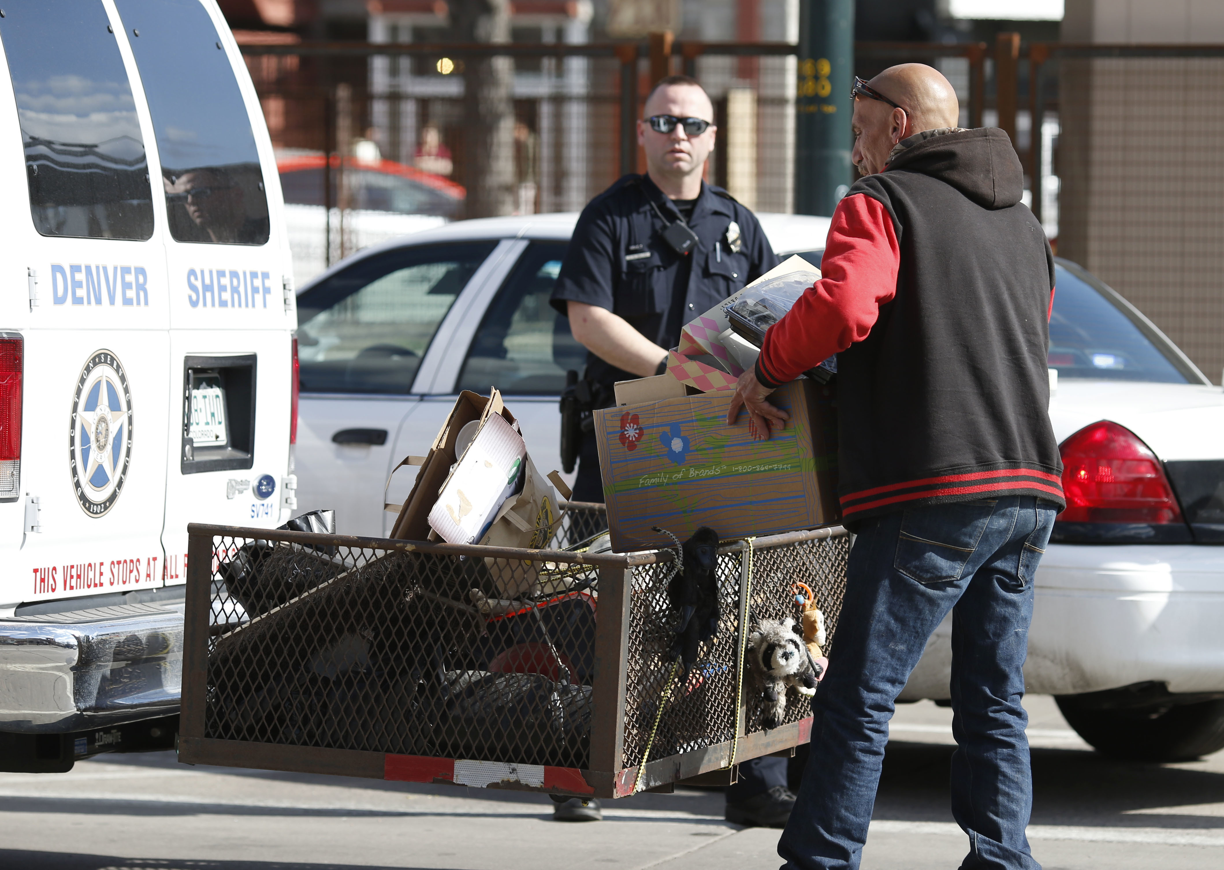 Photo: Homeless sweep downtown Denver March 2016 (AP Photo)