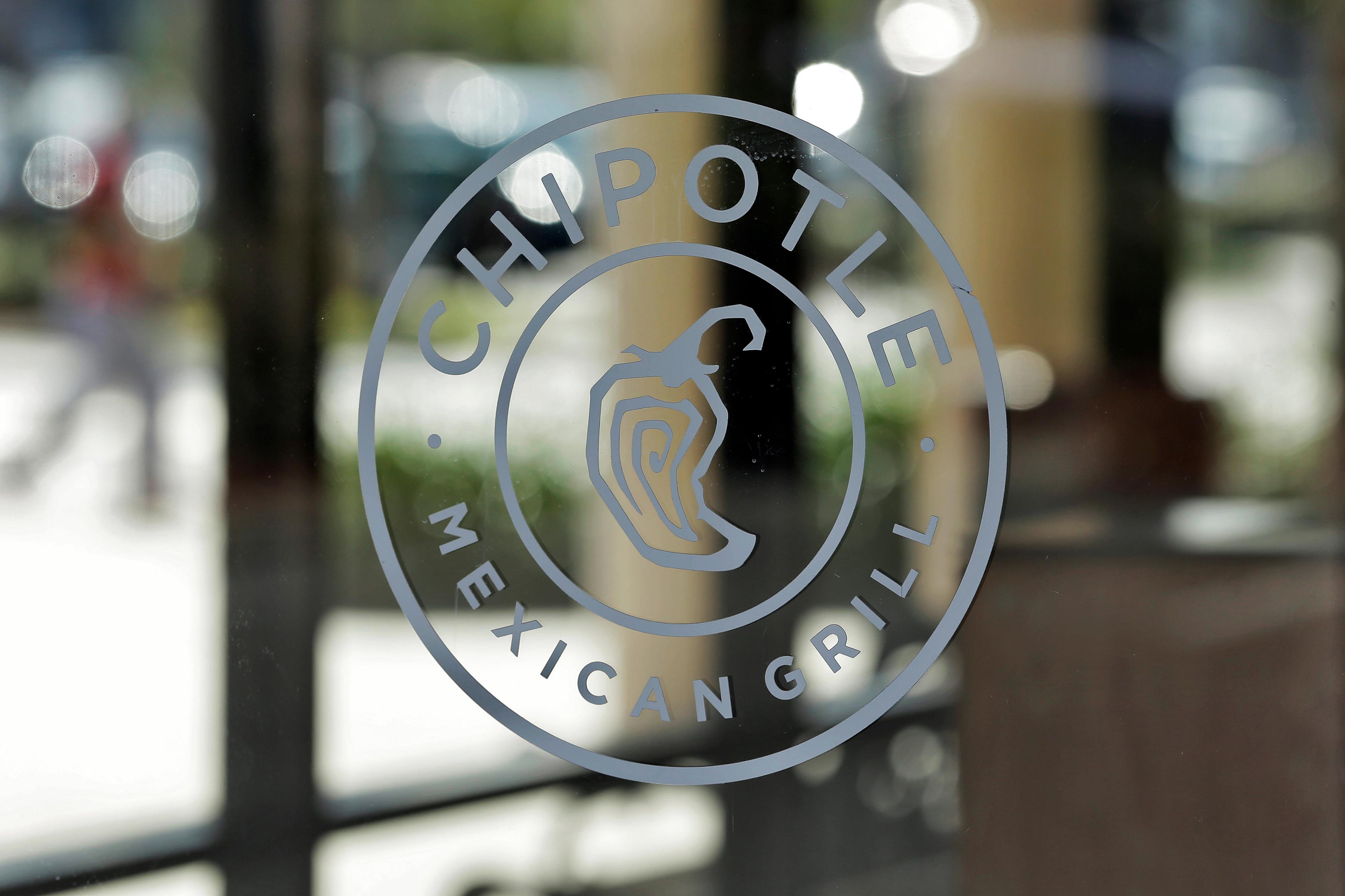 Photo: Chipotle CEO Search | Store Window - AP