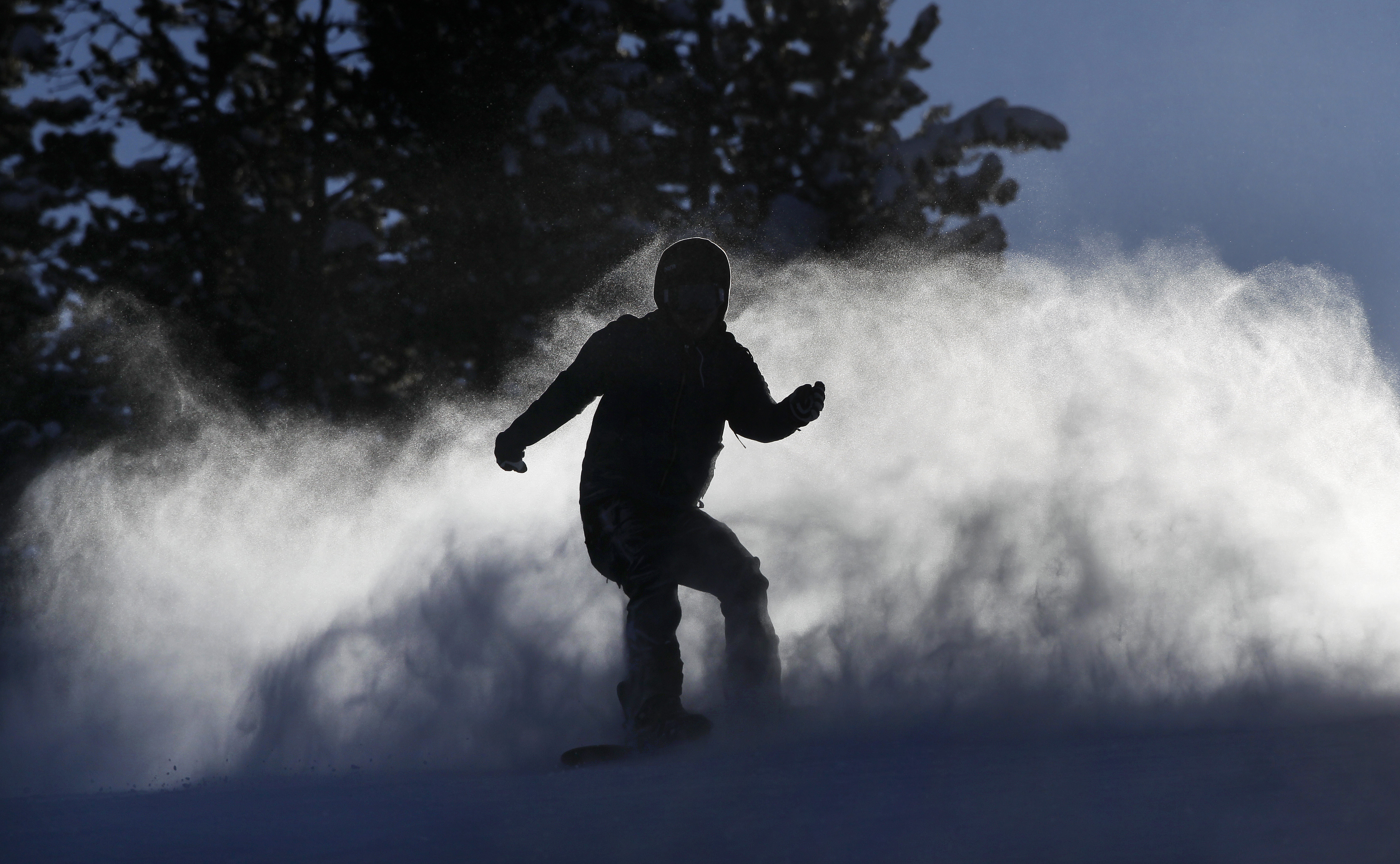 Photo: Snowboarder at Winter Park (AP Photo)