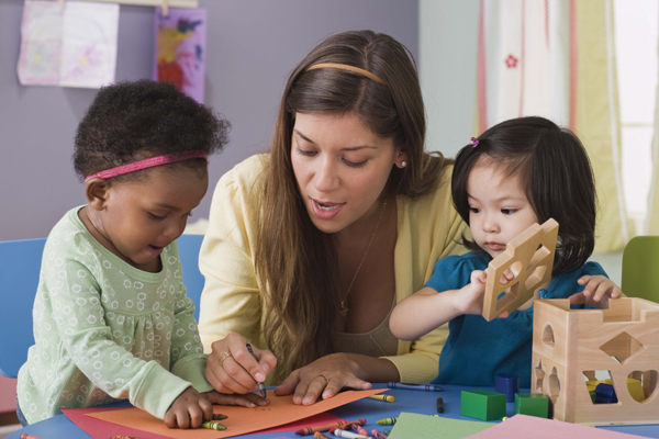 Photo: Pre-K (Female teacher with students)