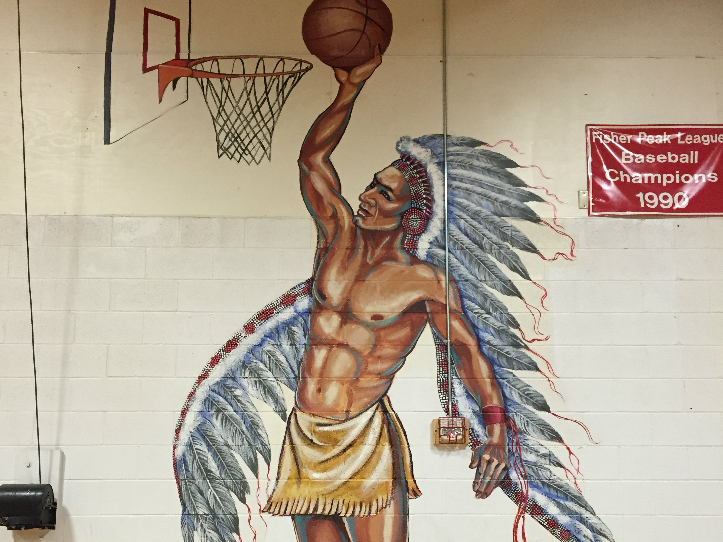 Photo: Indian painting dunking basketball