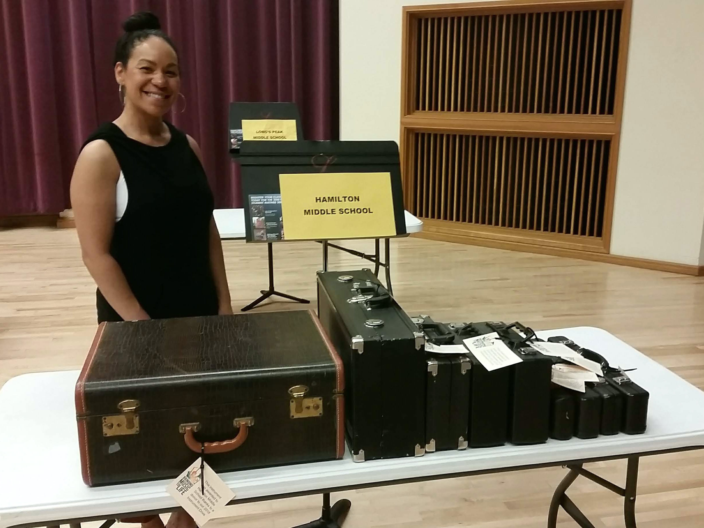 PHOTO: Priscilla Shaw with donated instruments from Bringing Music to Life