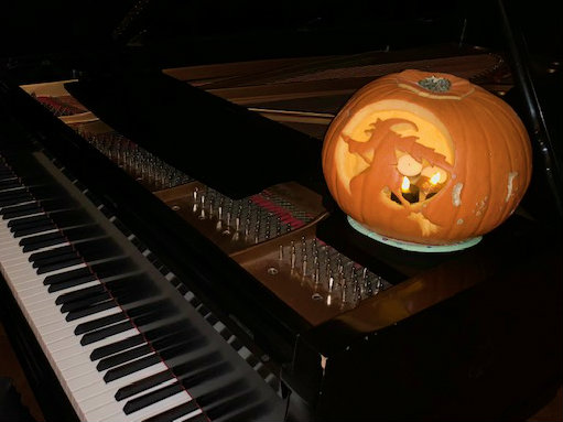 Photo: Spooky pumpkin on piano