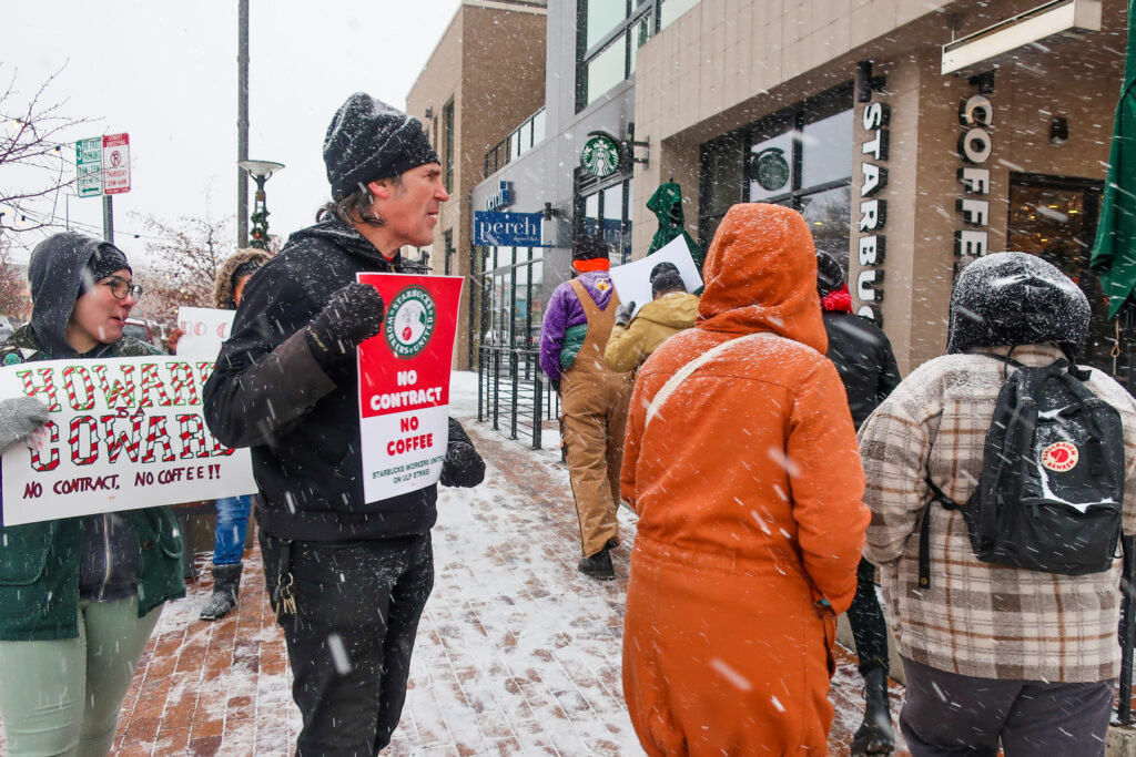 Thousands of Starbucks workers strike on Red Cup Day : NPR