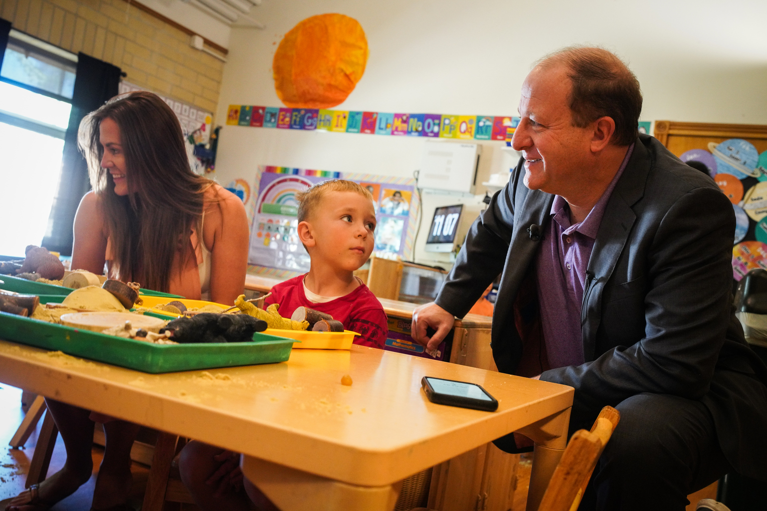 As Polis visits classrooms to tout universal preschool, providers are