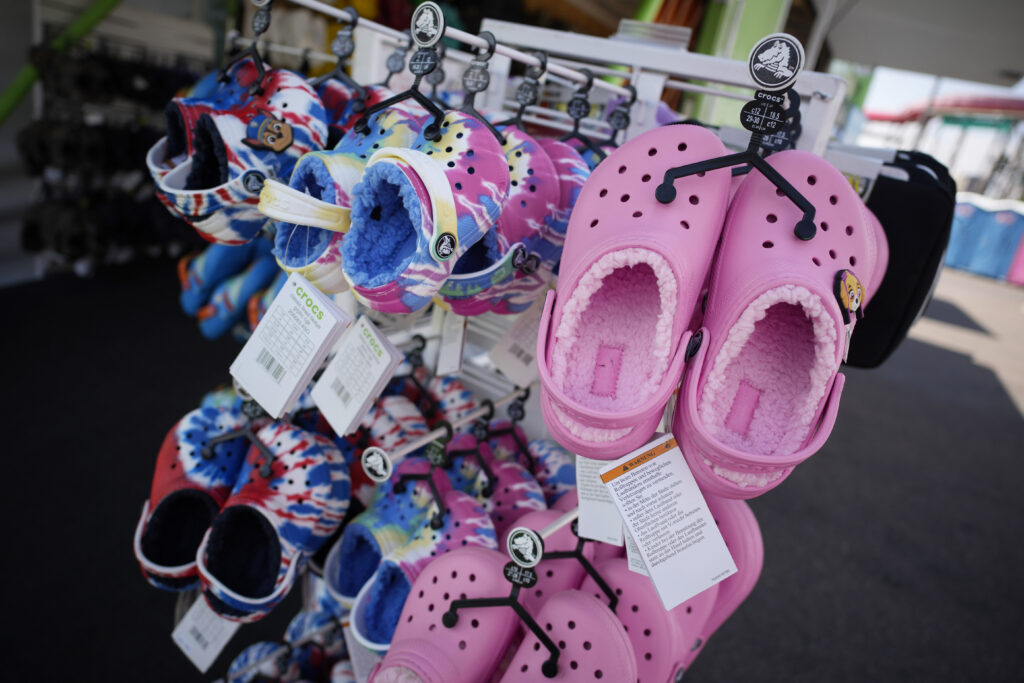 A display of Crocs stands
