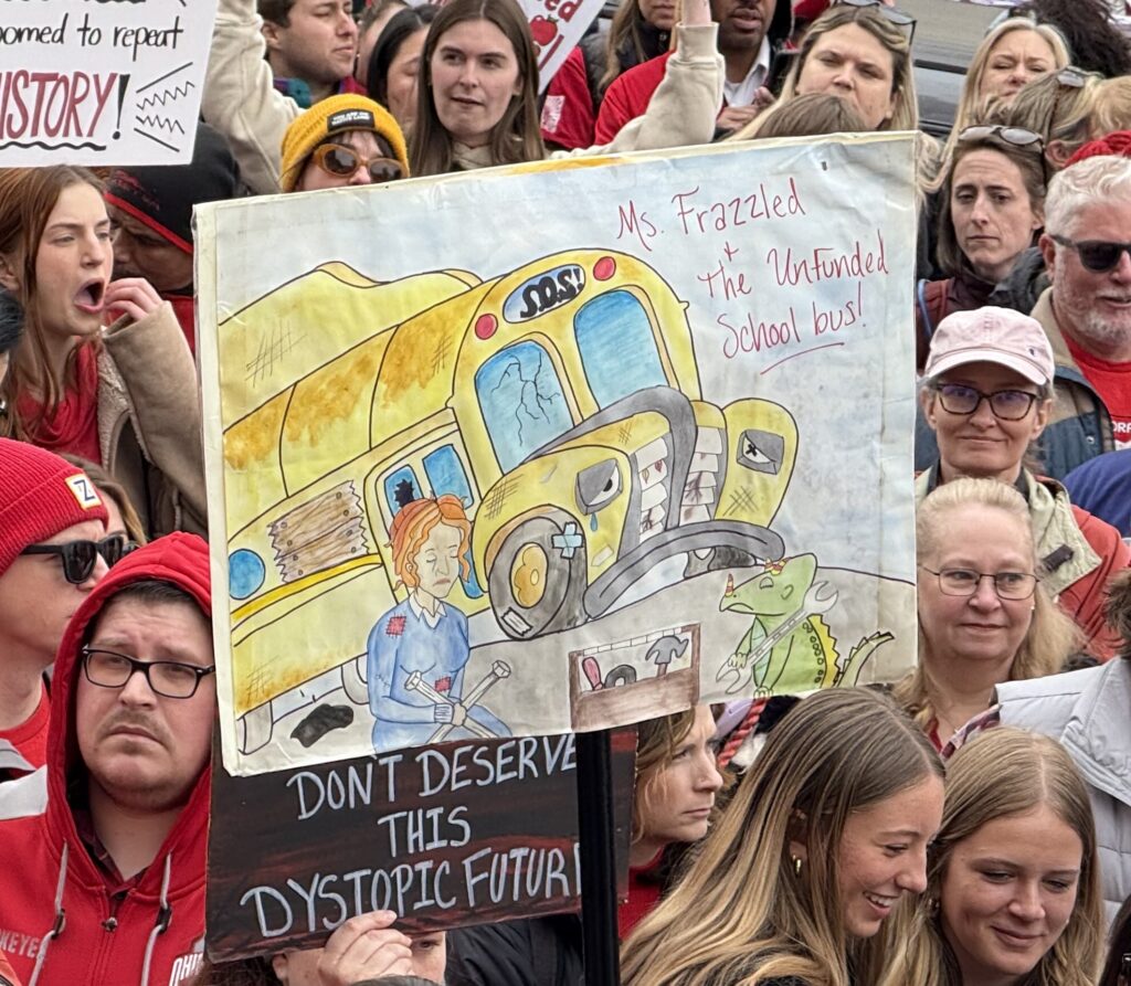 A sign at a rally.