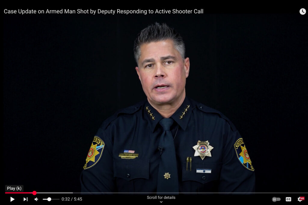 Douglas County, CO Sheriff Darren Weekly in blue uniform with gold badge.
