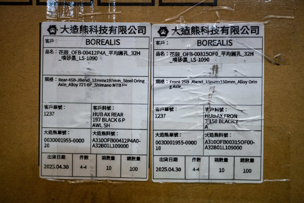Boxes of bike components shipped from China and Taiwan are stacked high at Borealis in Colorado Springs