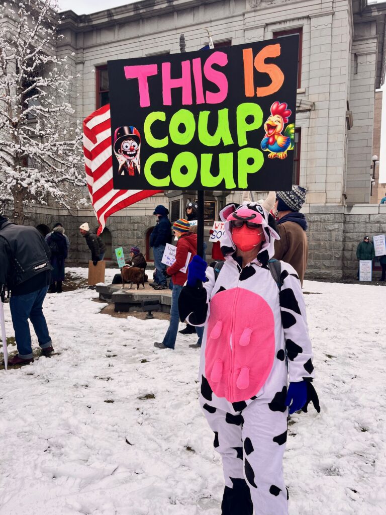 person holding sign