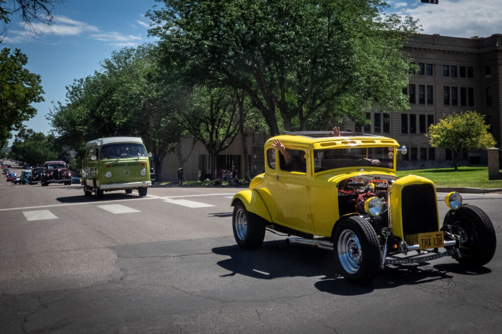 custom vehicles in a parade