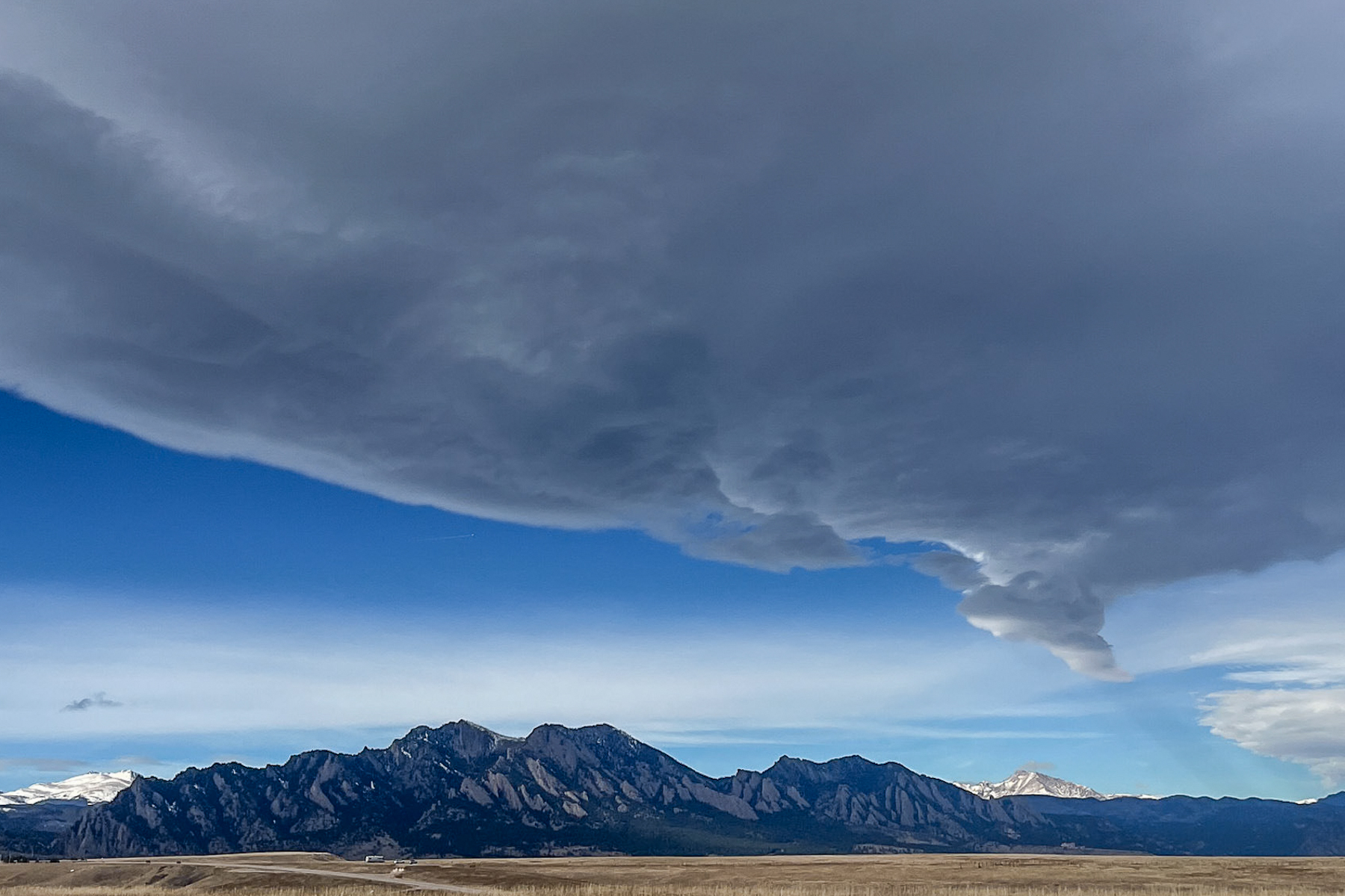 Fall clouds over the Flatirons on Colorado’s Front Range in Boulder County.