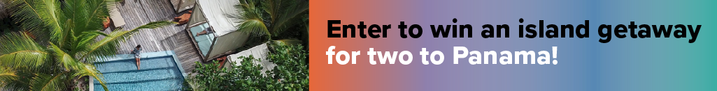 A private pool at a modern cabin surrounded by palm trees. Enter to win an island getaway for two to Panama!