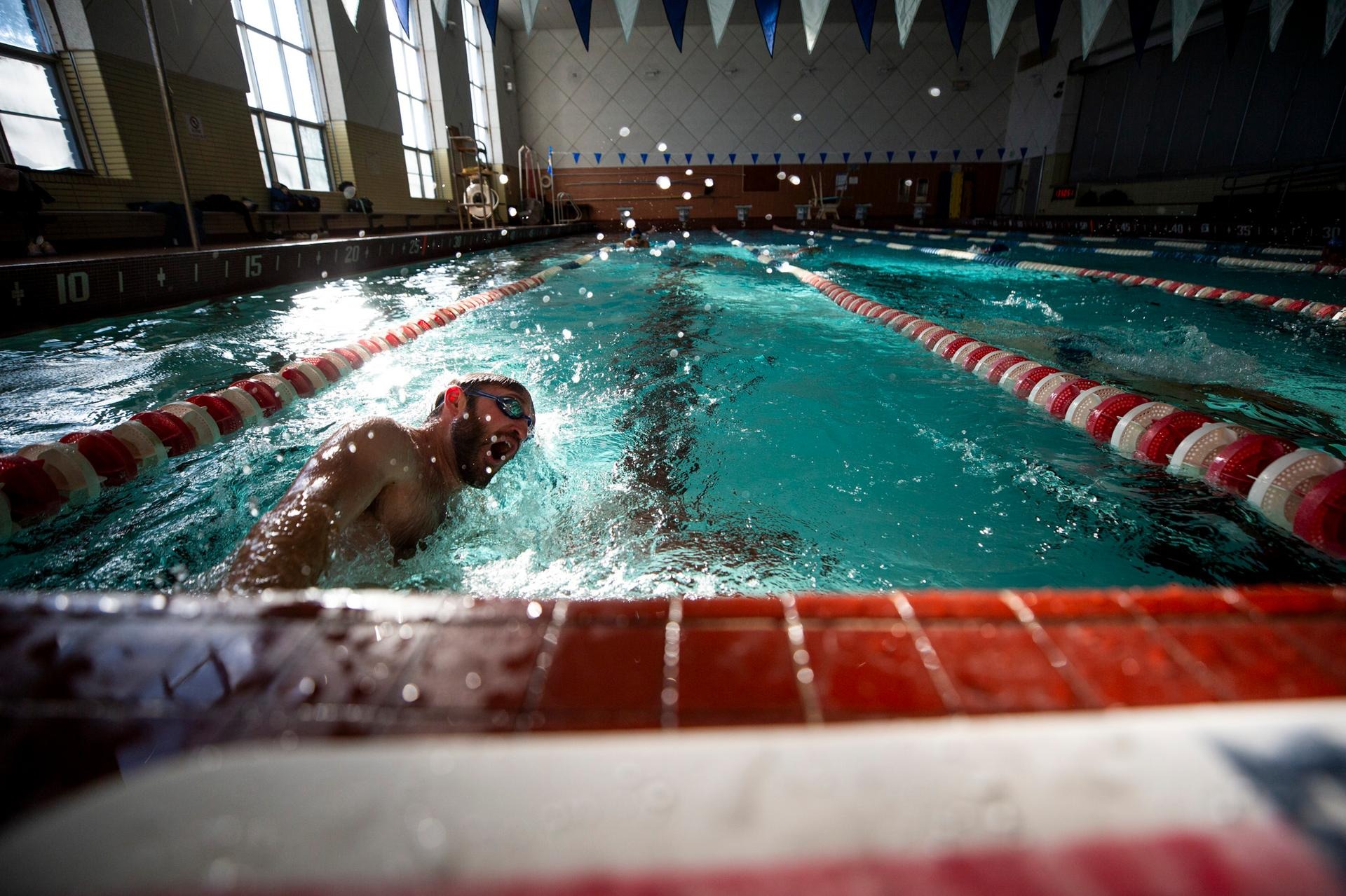 Listen: Denver’s queer swim team is splashing back after the city displaced them