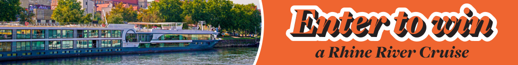 A medium-size cruise ship on a river. Enter to win a Rhine River Cruise.