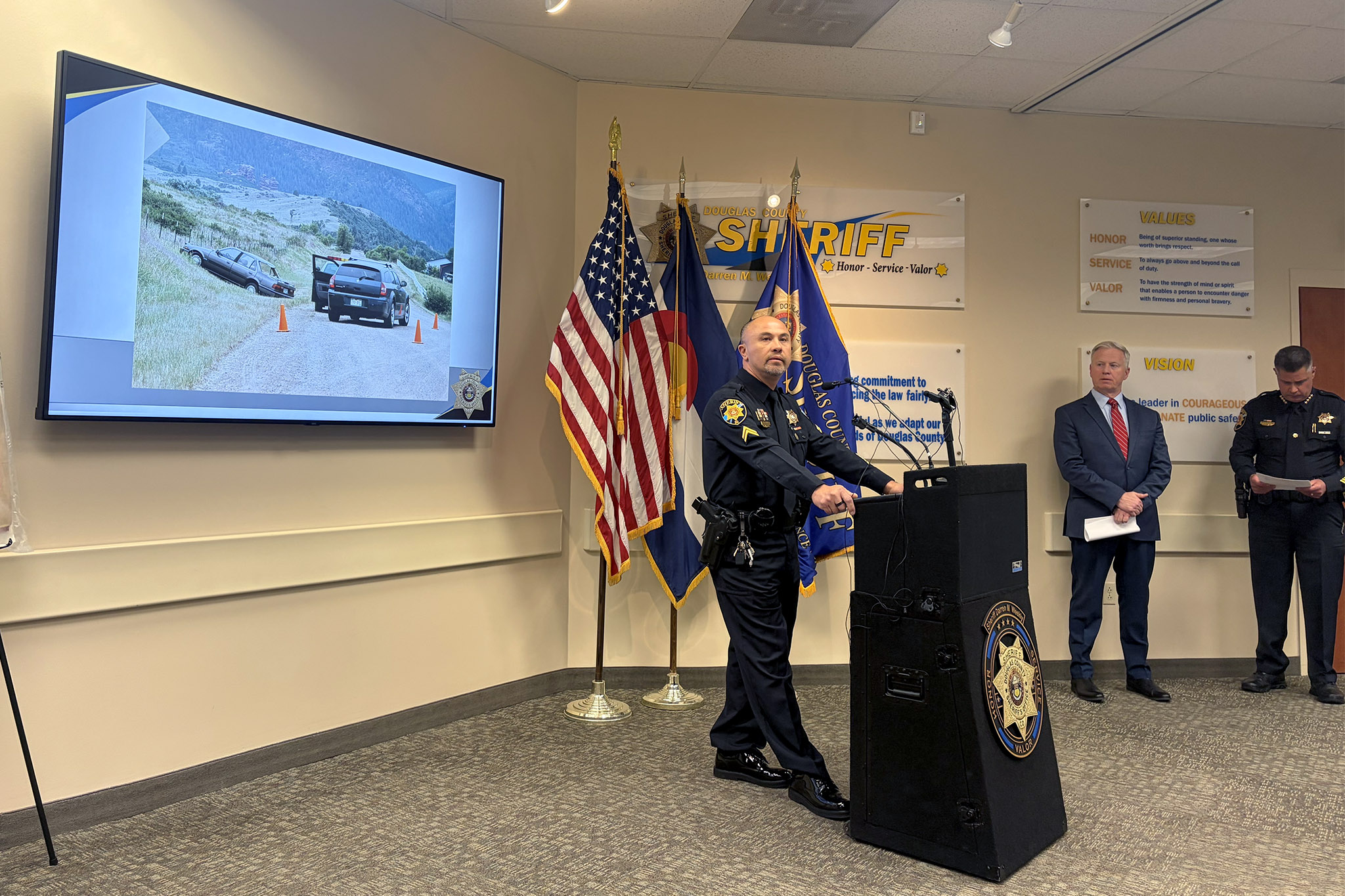 Gov. Polis shortens the sentence of a man who shot at two Douglas County deputies in 2008